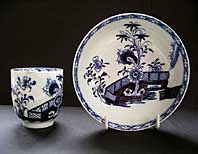 LOWESTOFT PORCELAIN RARE BLUE AND WHITE SCROLL HANDLE COFFEE CUP & SAUCER CHINESE GARDEN SCENE PATTERN C.1770-1780 front
