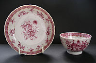 CHINESE EXPORT PORCELAIN TEABOWL AND SAUCER DECORATED IN ENGLAND WITH CARMINE FLORAL WORKSHOP OF JAMES GILES STYLE PATTERN C.1755-65