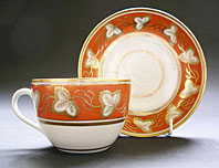 NEW HALL STAFFORDSHIRE RARE ORANGE GROUND BUTE SHAPE TEACUP AND SAUCER - PATTERN 508 C.1790-95